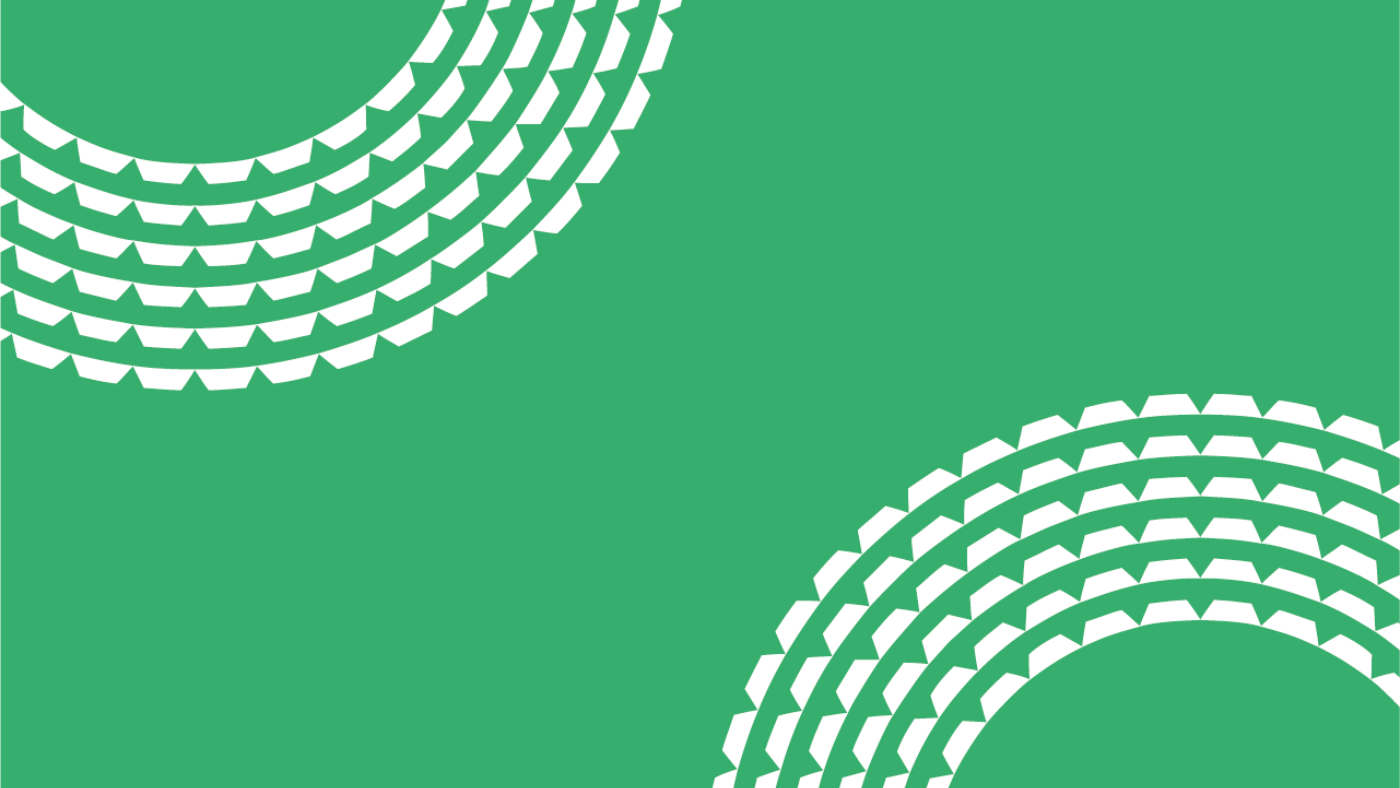 Two white patterned circles in the top left and bottom right corners on a green background.